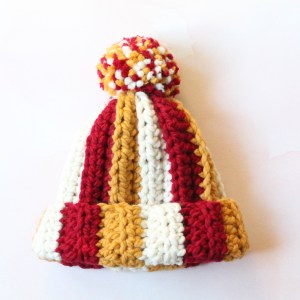 On the hunt for a super cute crochet hat pattern to show your support for Taylor, I mean Taylor’s boyfriend, I mean the Kansas City Chiefs? Whether you’re a die-hard Chiefs fan or a Swiftie who loves a cozy crochet project, I have the perfect pattern that’s bound to make your heart (and head) happy.